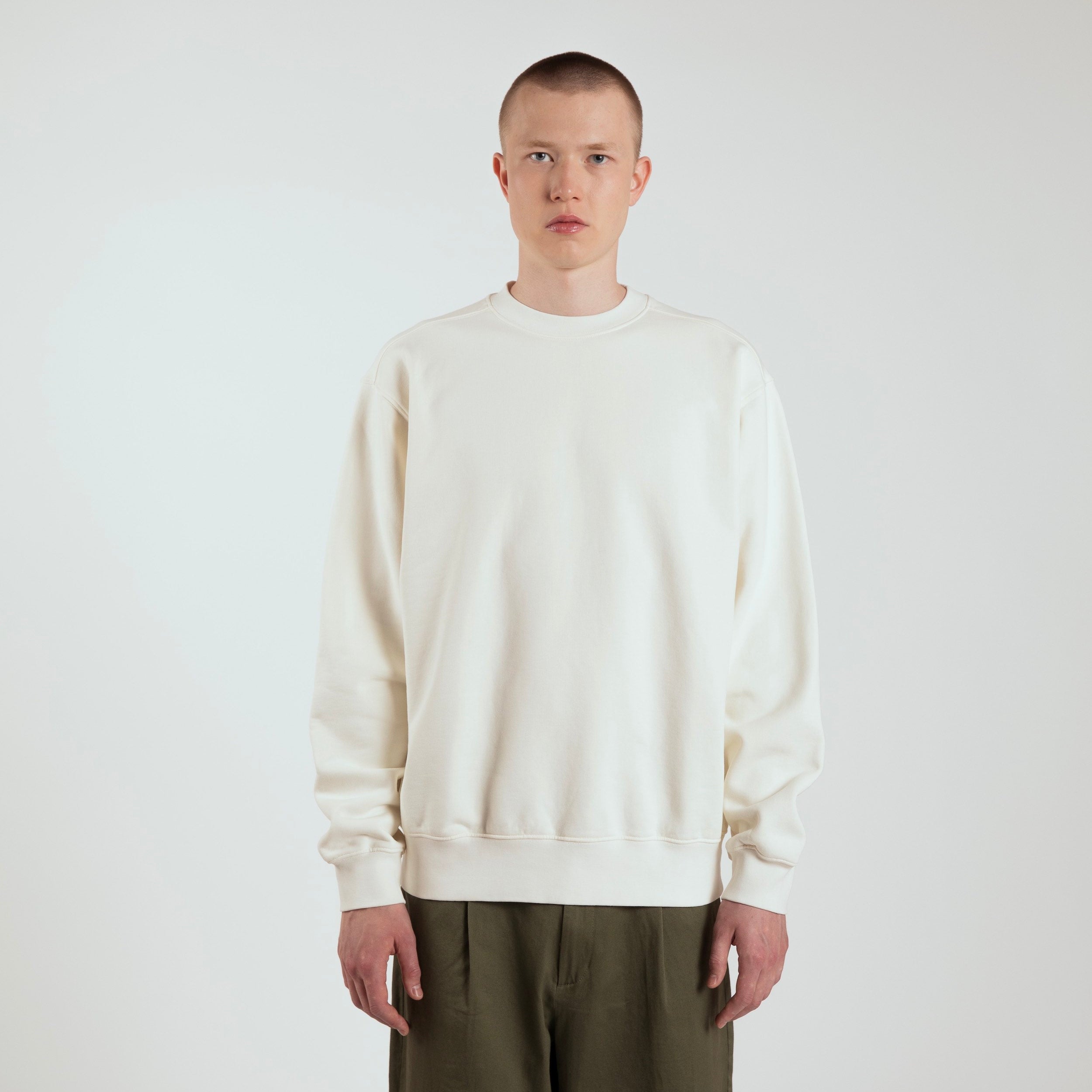 Styled look of fleeceback crewneck FCBK040, premium merch blank from ArchesGlobal.co.